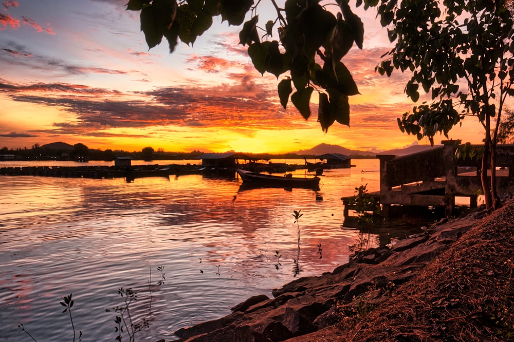 a sunset over a lake