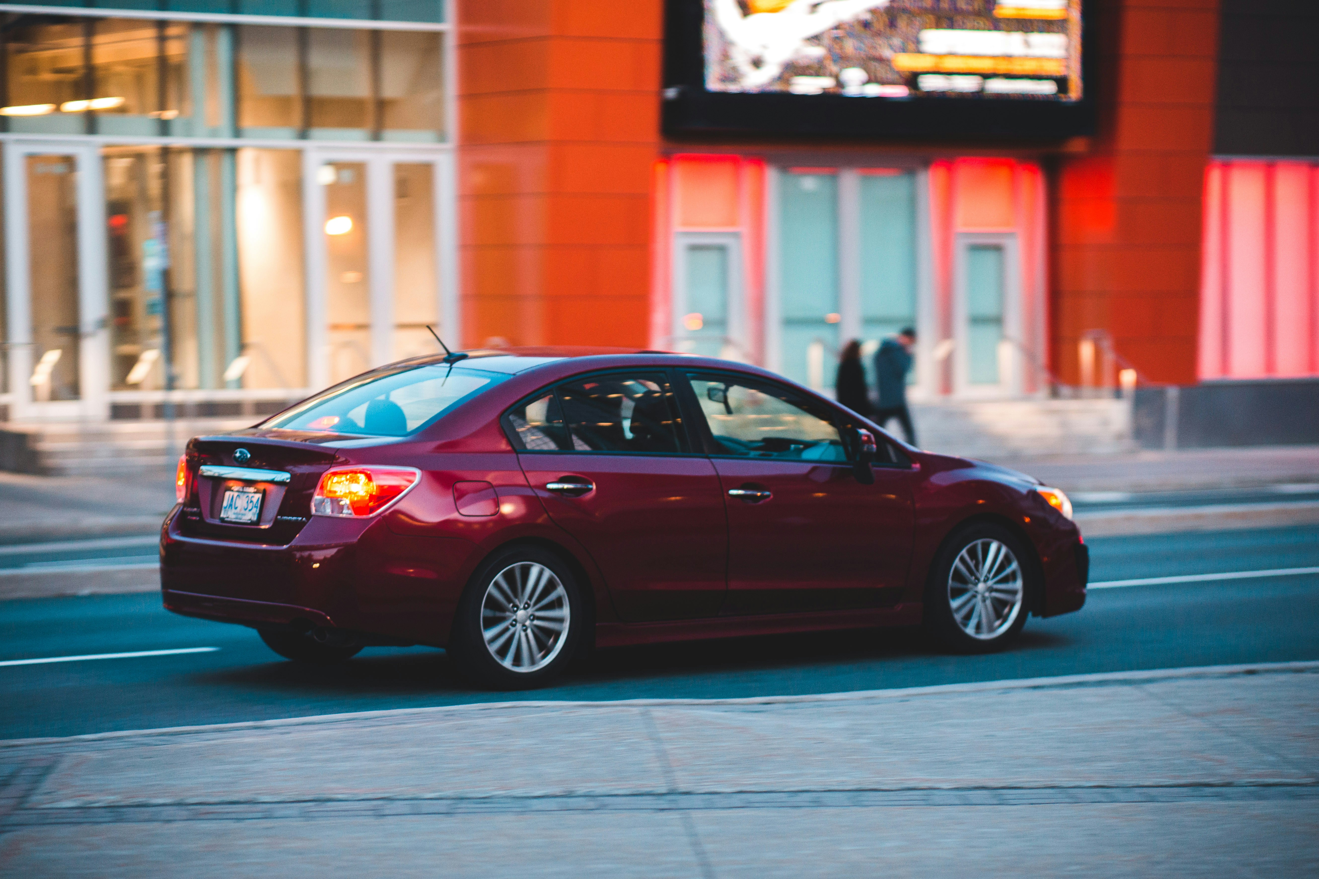 modern compact sedan road, wallpaper, 2026 Nissan Compact Car Towing Capacity: Full Guide & Limits 4
