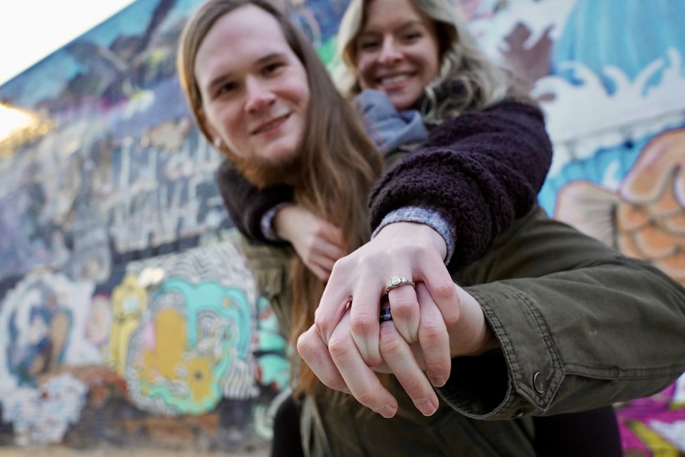 a man holding a woman