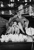 Family enjoying a water sport in vibrant Malaysia.