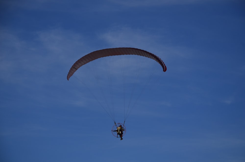 a person parachuting in the air