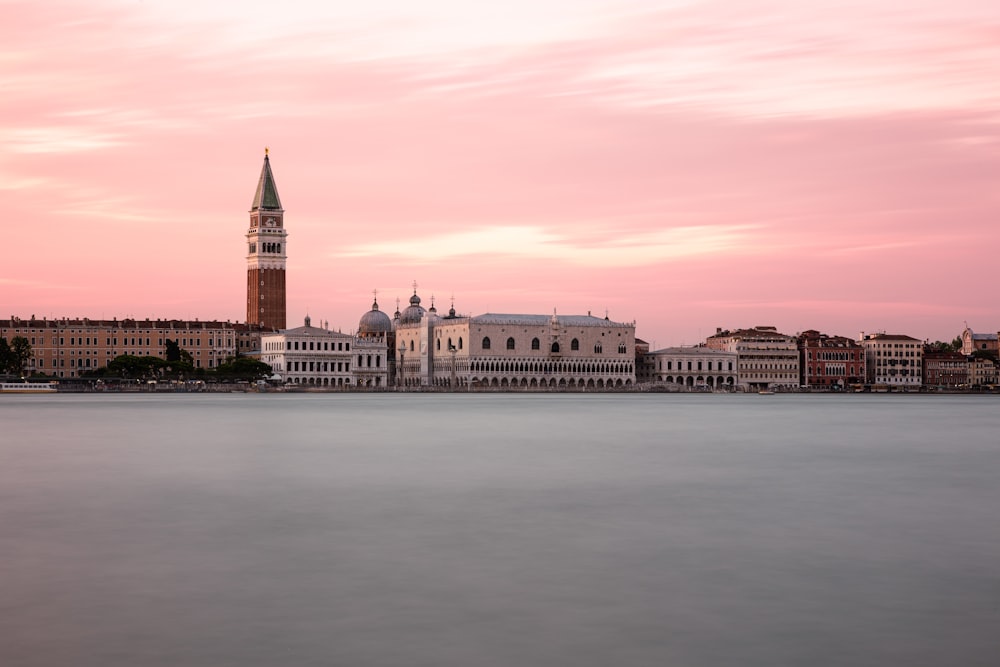 a body of water with buildings along it