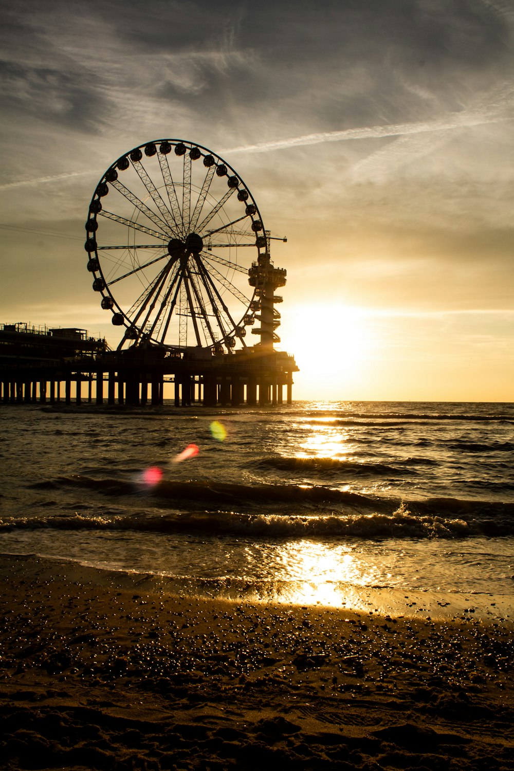 a ferris wheel on a beach