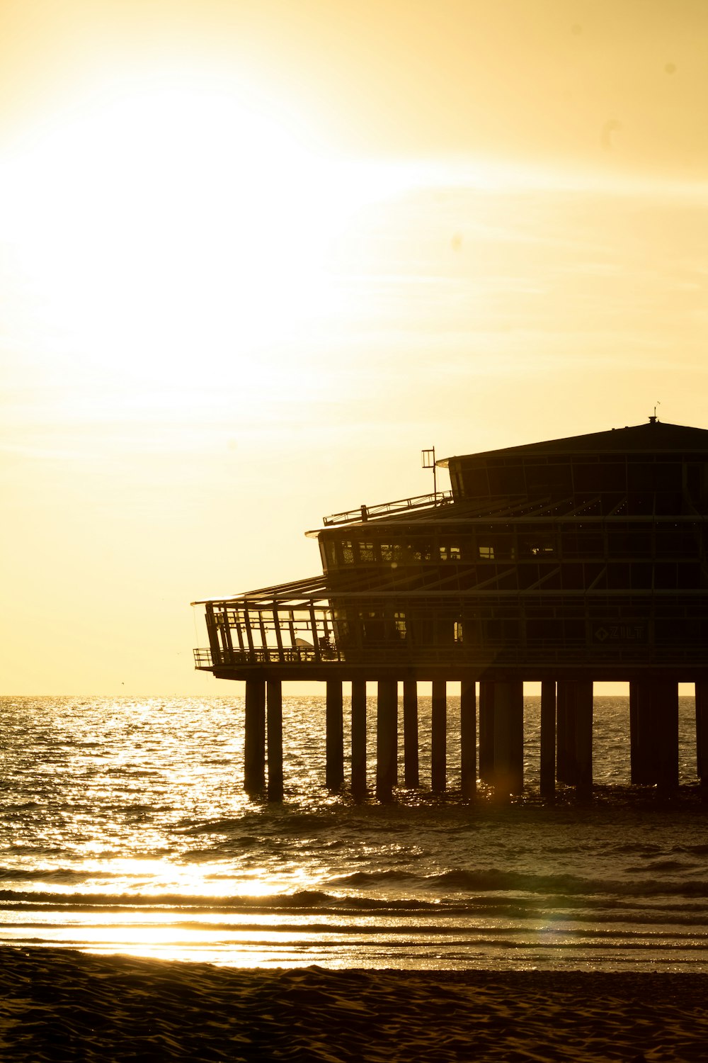 a pier with a building on it