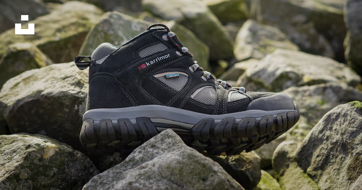 Shoes With Rocks Inside A black shoe on rocks photo – Free Footwear Image on Unsplash