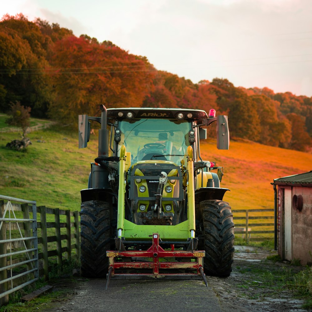 a tractor parked on a dirt road