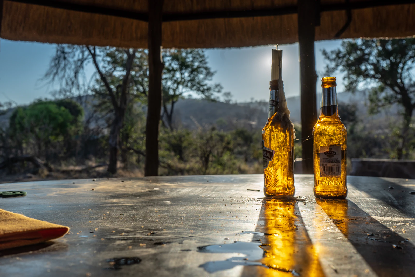 Sundowner table and amber evening light