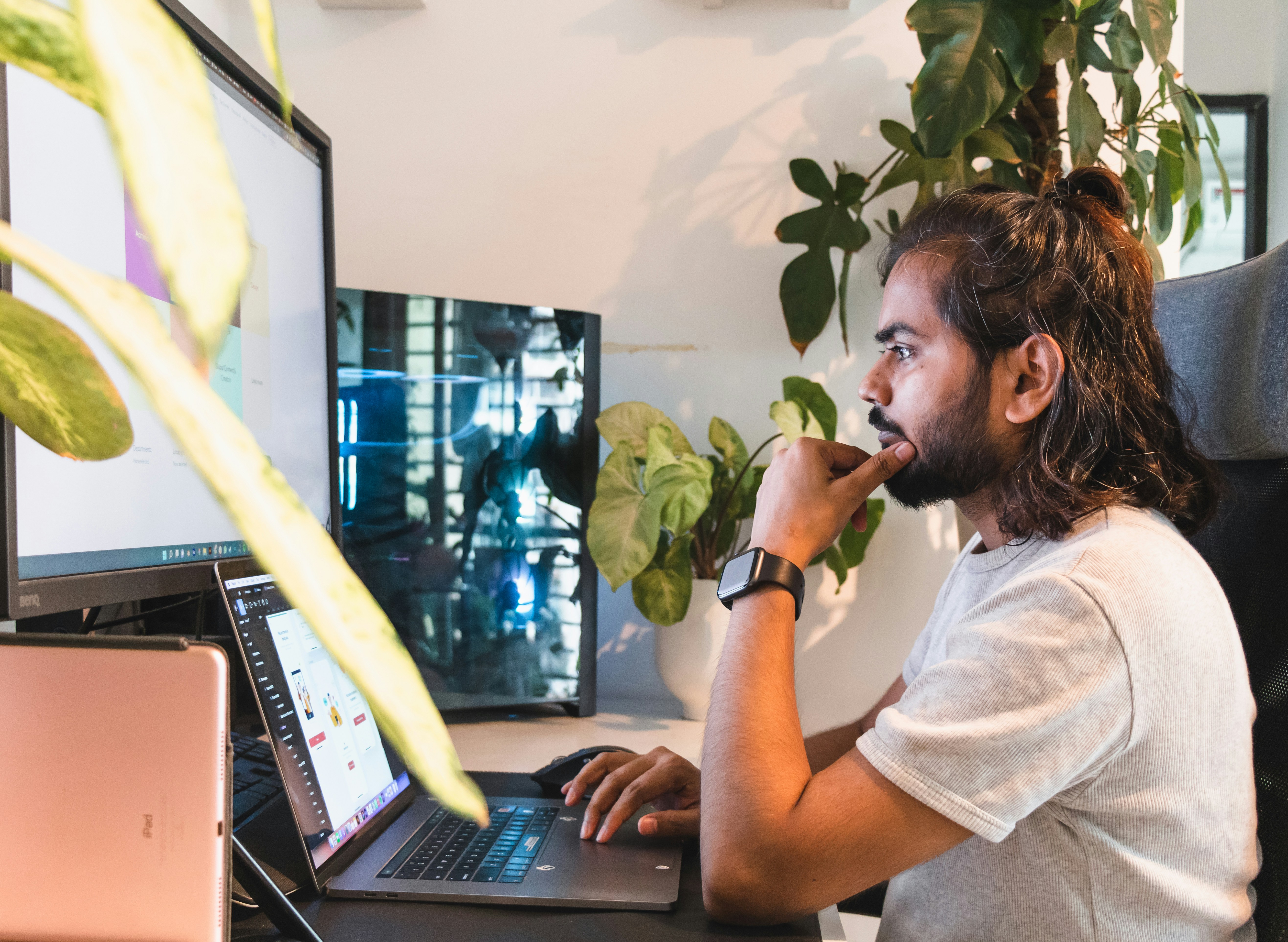 person using laptop at desk
