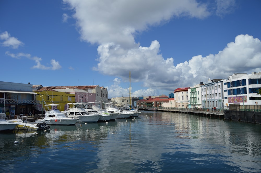 a boat is docked next to a body of water