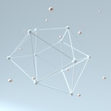 a white antenna with many small balls