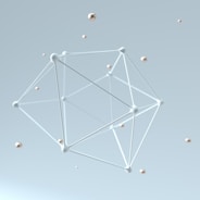 a white antenna with many small balls