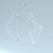 a white antenna with many small balls