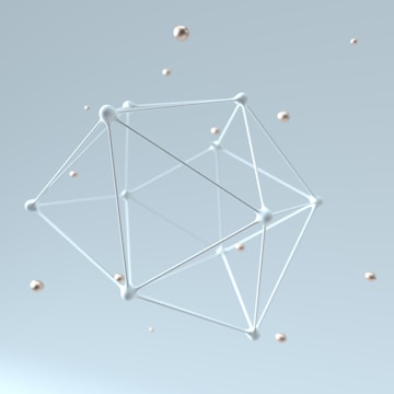 a white antenna with many small balls