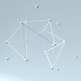 a white antenna with many small balls