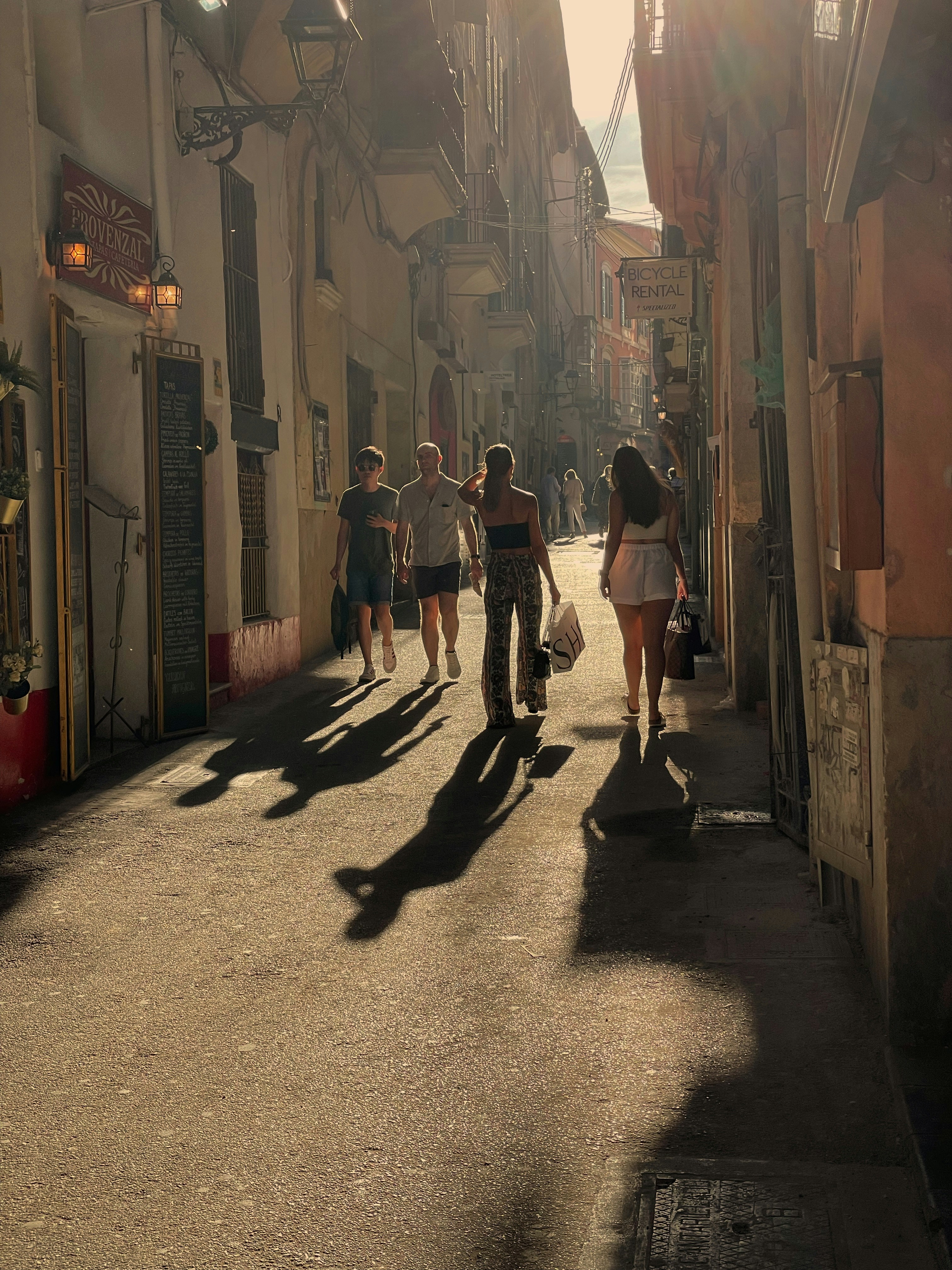 people walking down a street