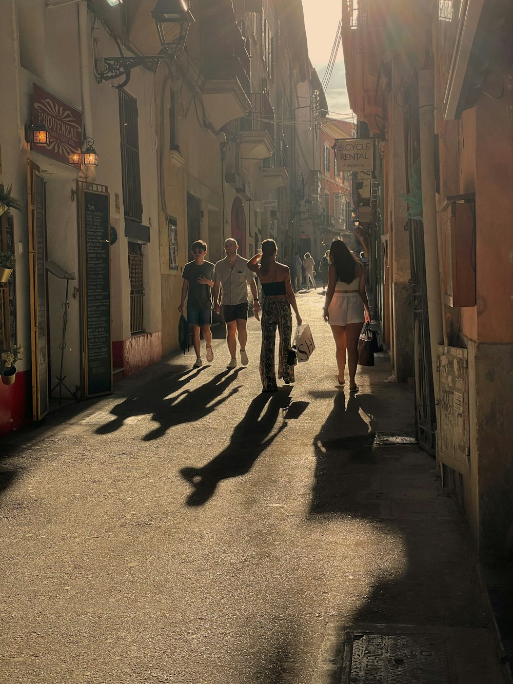 people walking down a street