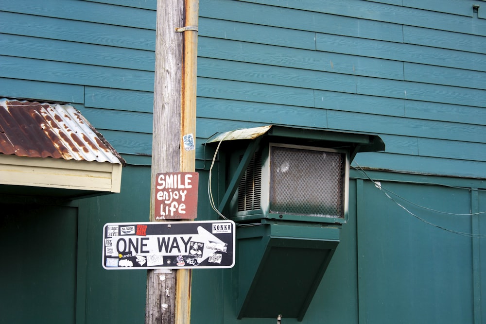 a street sign is posted on a pole