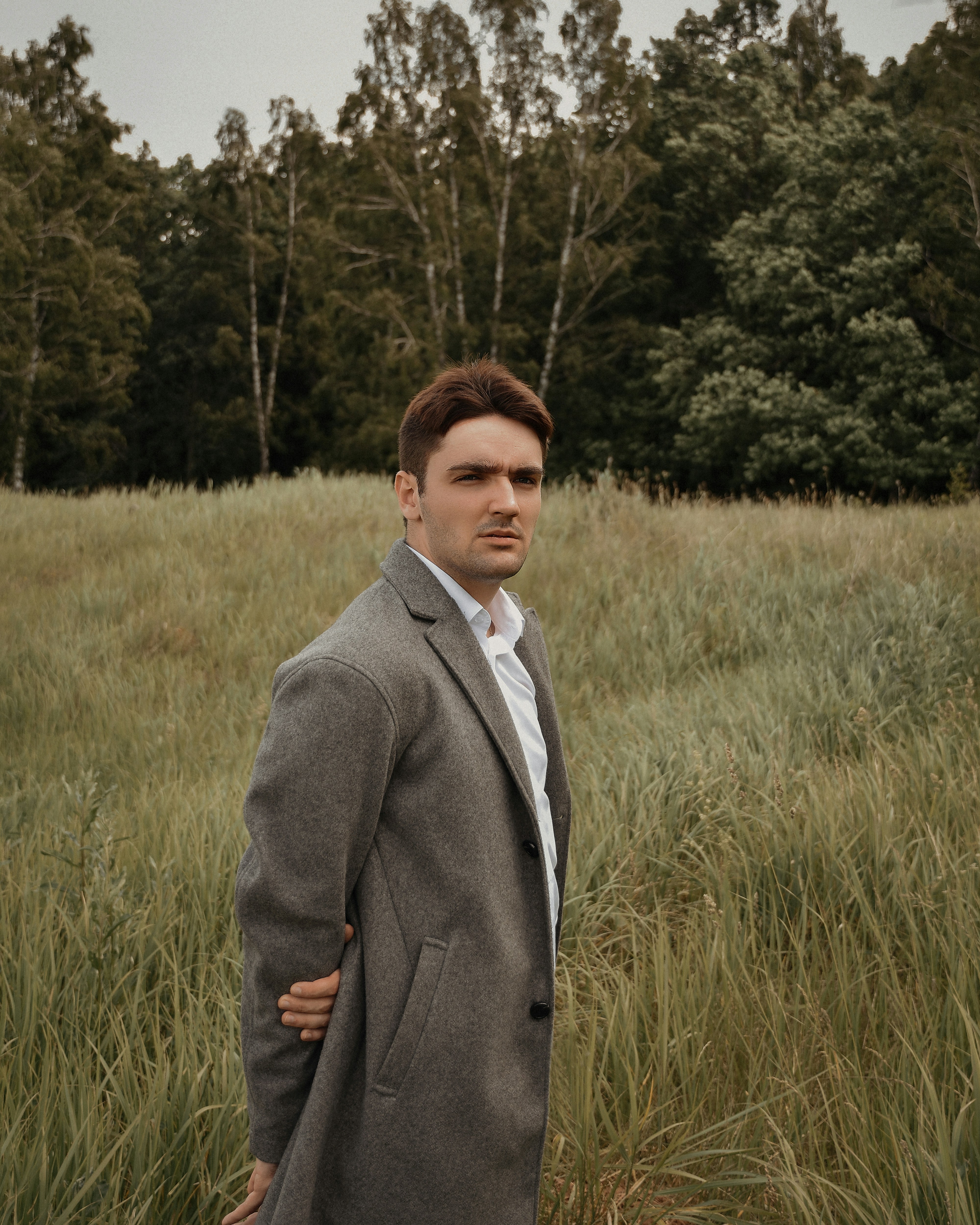 a man standing in a field