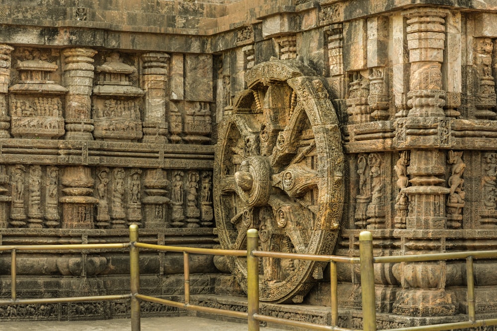 a stone wall with carvings