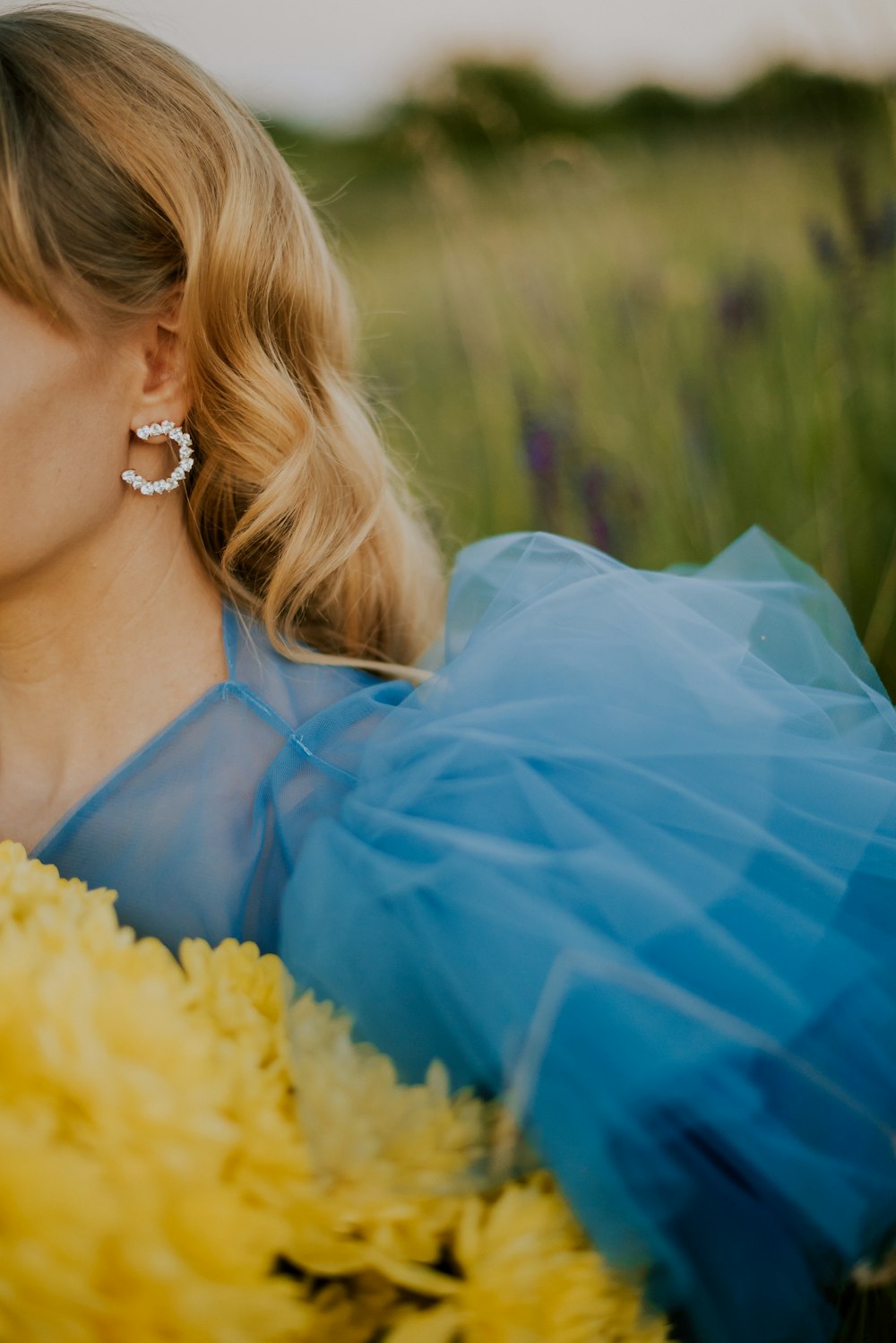 a woman wearing a blue dress