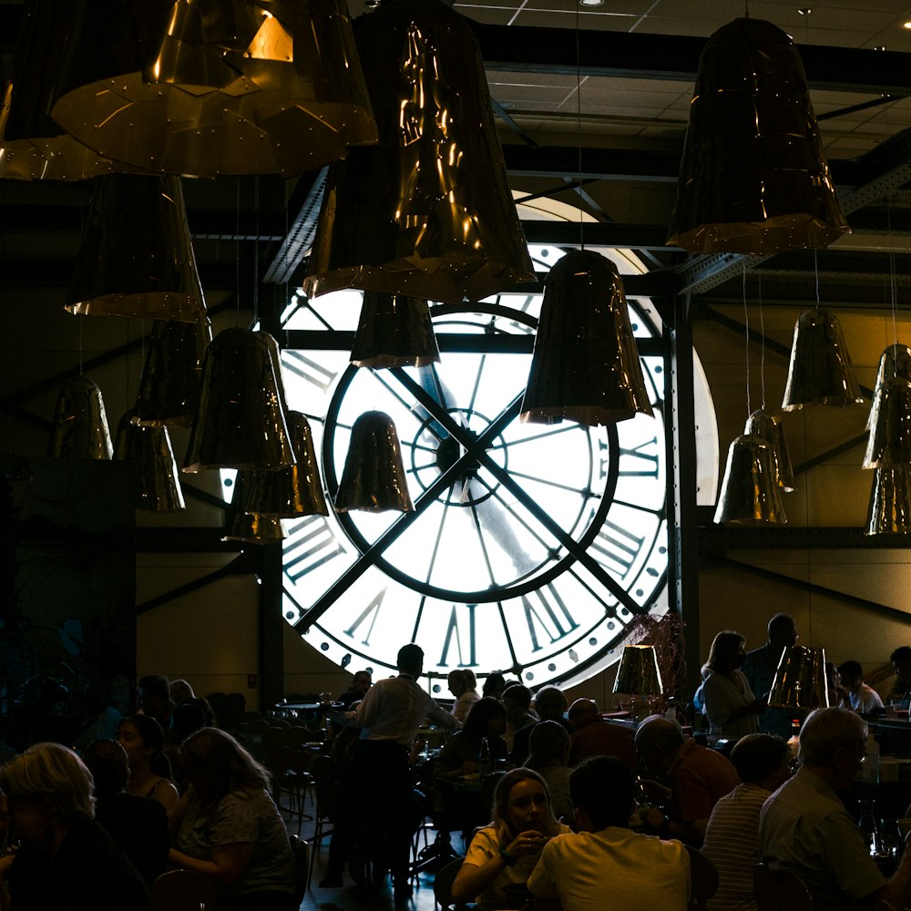 a group of people in a room with lights