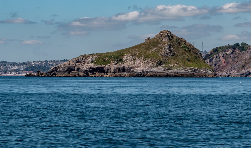 a rocky island in the water