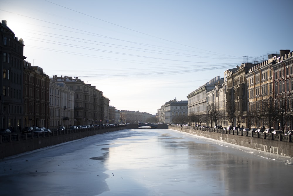 a river with buildings along it