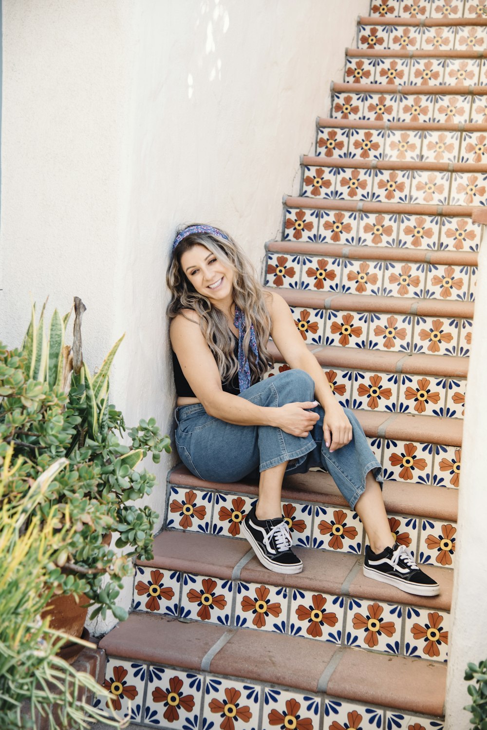 a woman sitting on a staircase