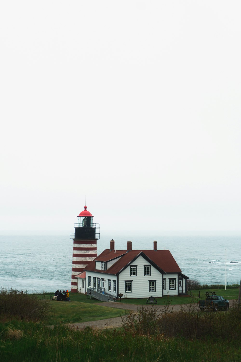 a lighthouse by the water