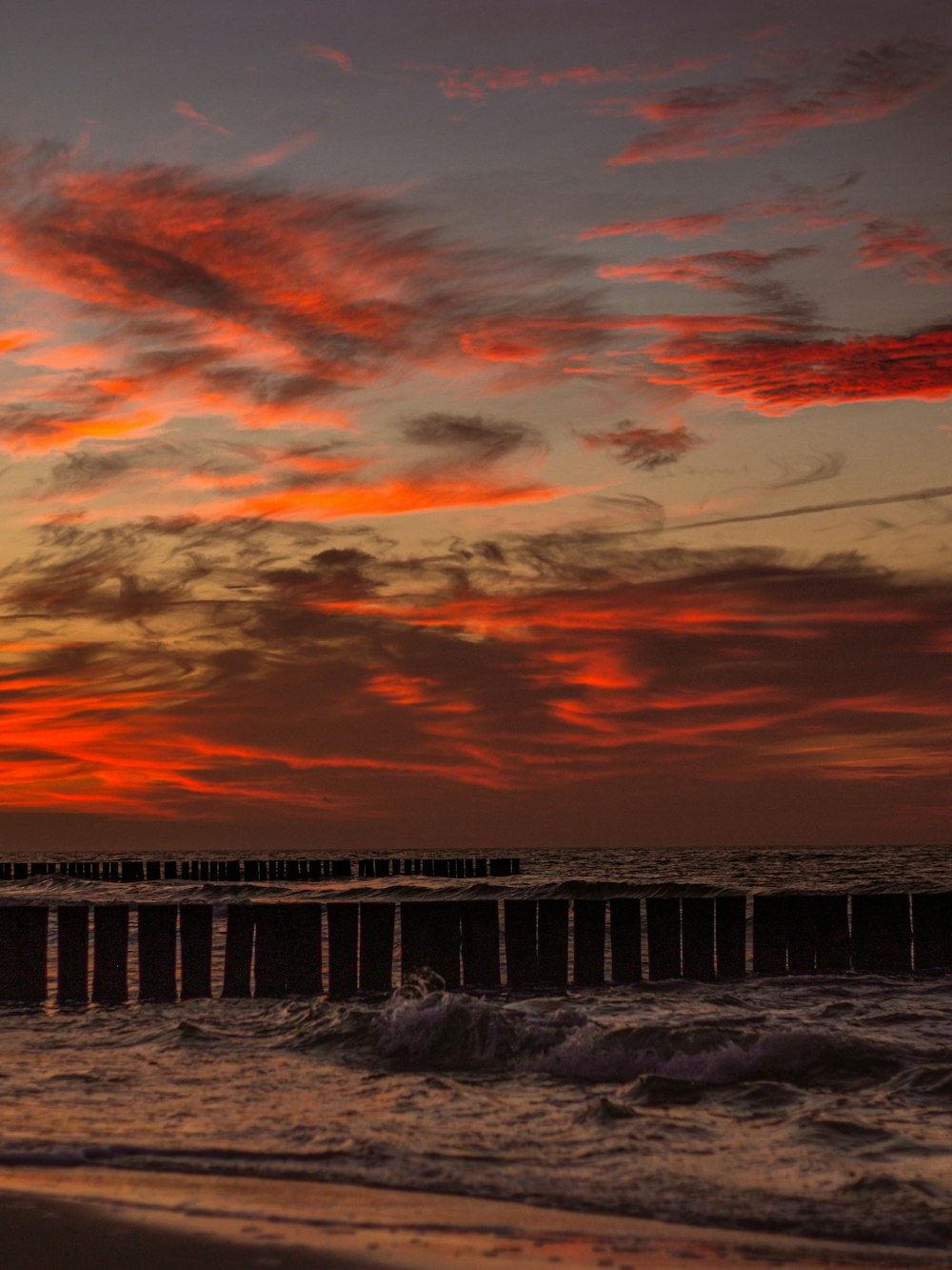 a sunset over a beach