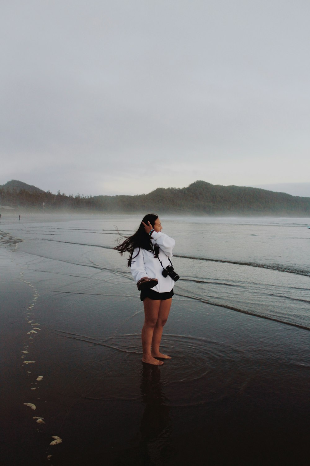 a person standing on a beach