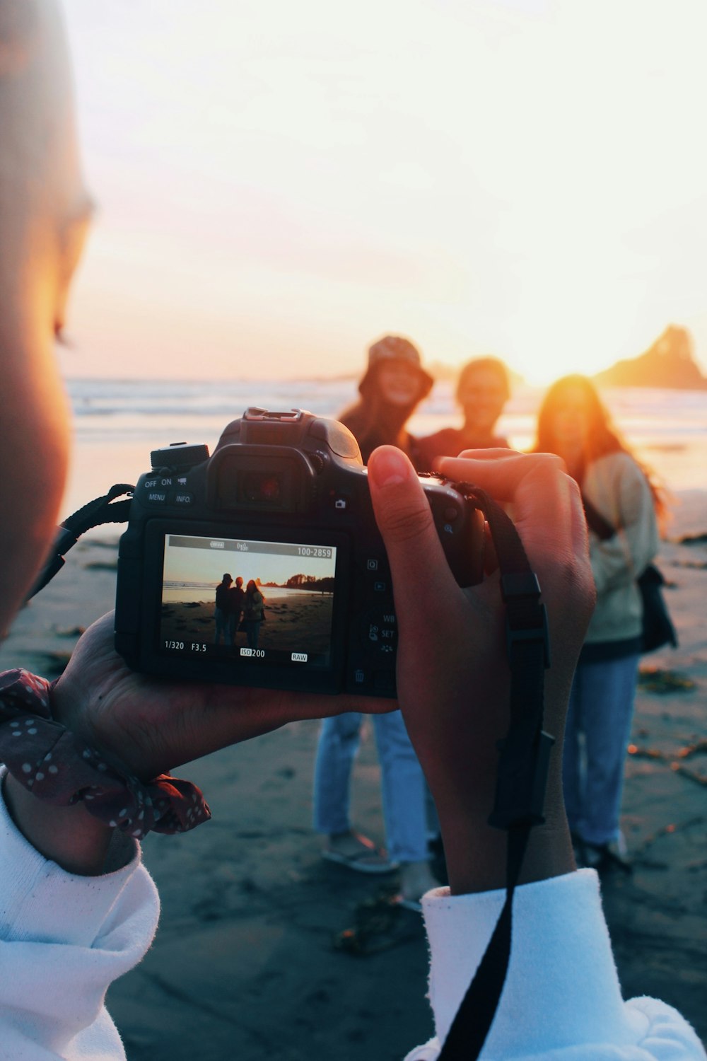 a person holding a camera