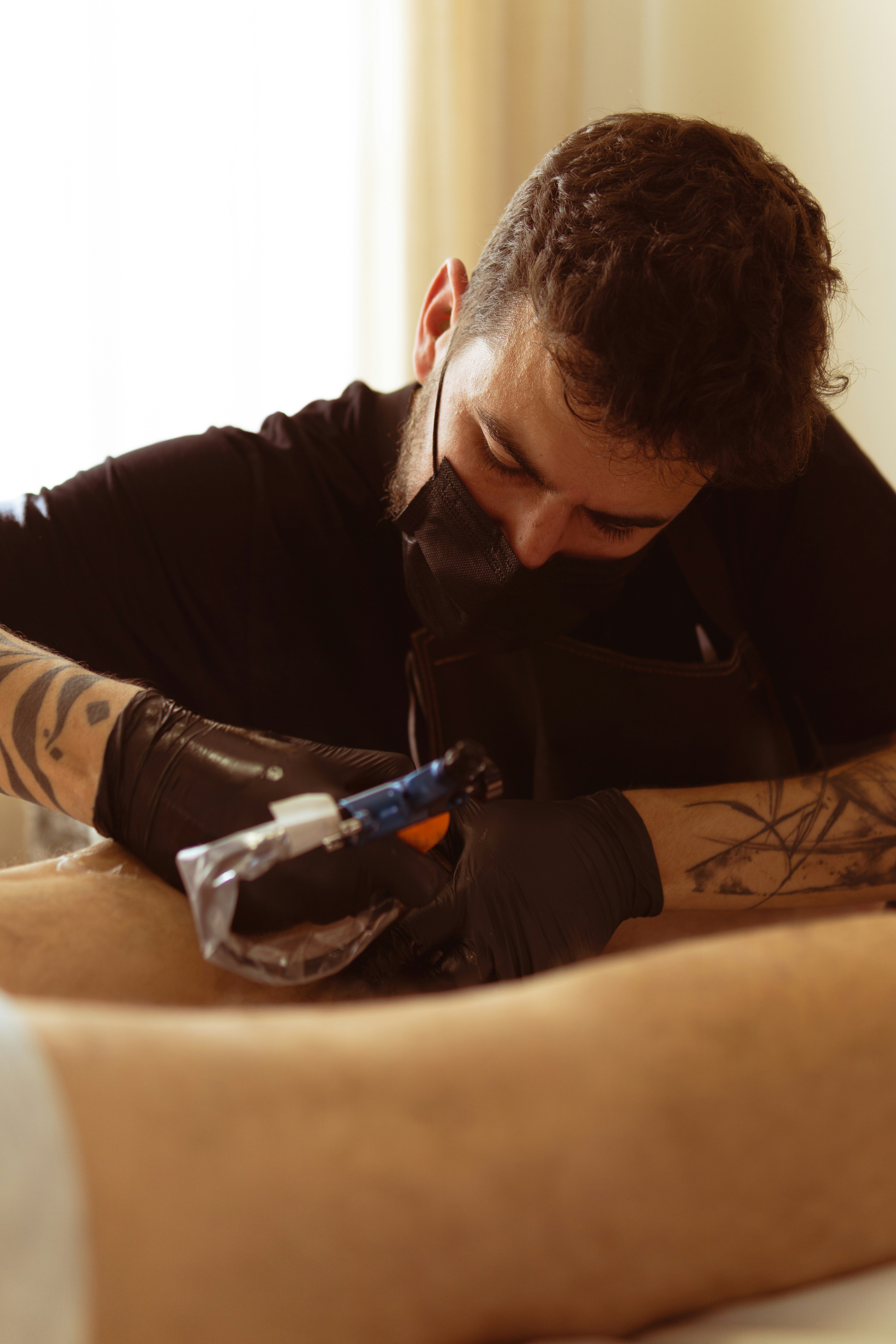 8 Things to Know Before Getting Tattooed by a Guest Artist