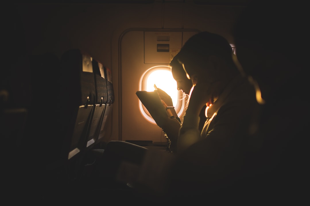 a person holding a book, .2016