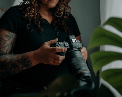 a person holding a camera