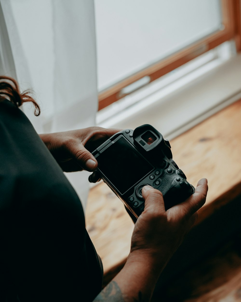 a person holding a game controller