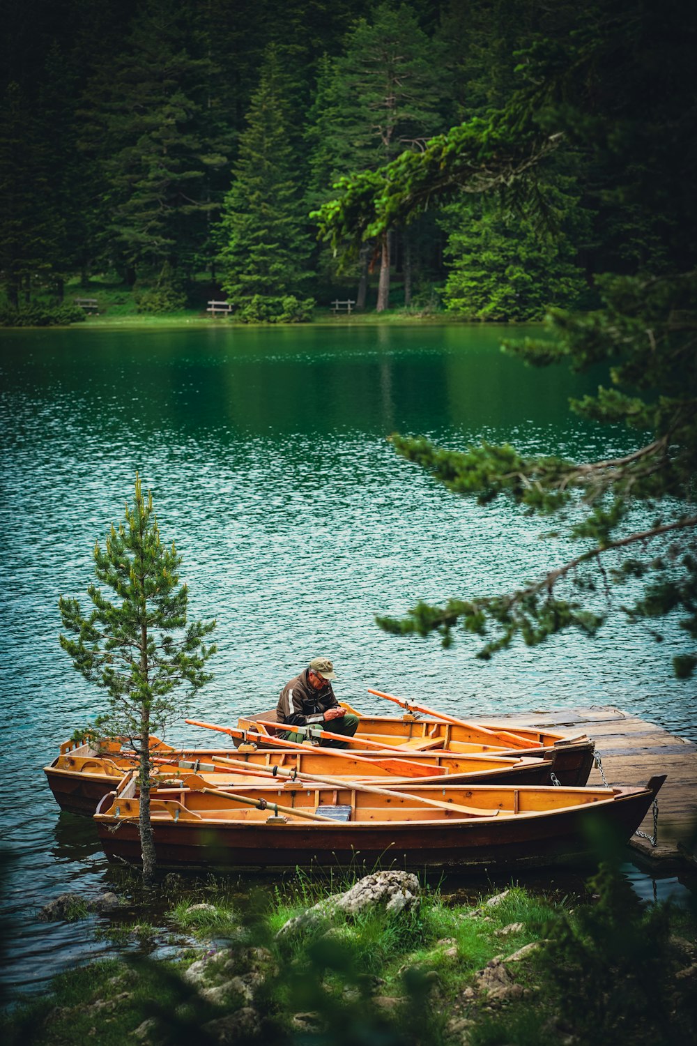 a person in a canoe on a lake