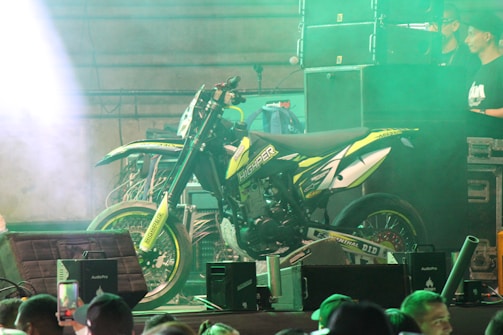 A vibrant display of various raffle prizes including a motorcycle.