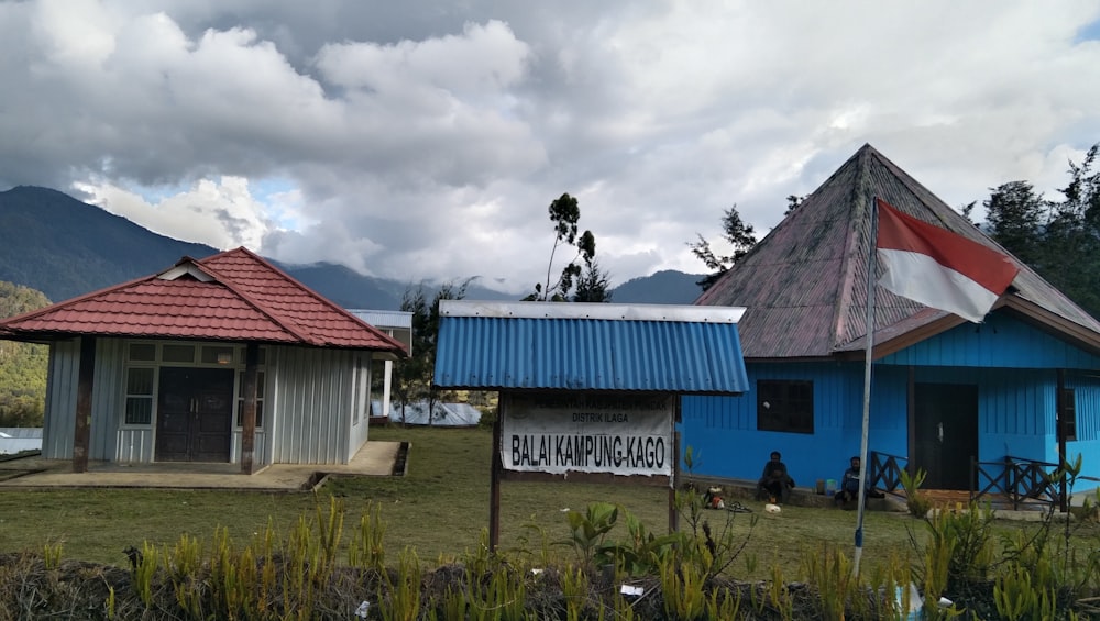 a few buildings with a sign in front of them