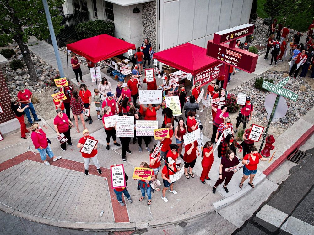 a group of people marching in the street