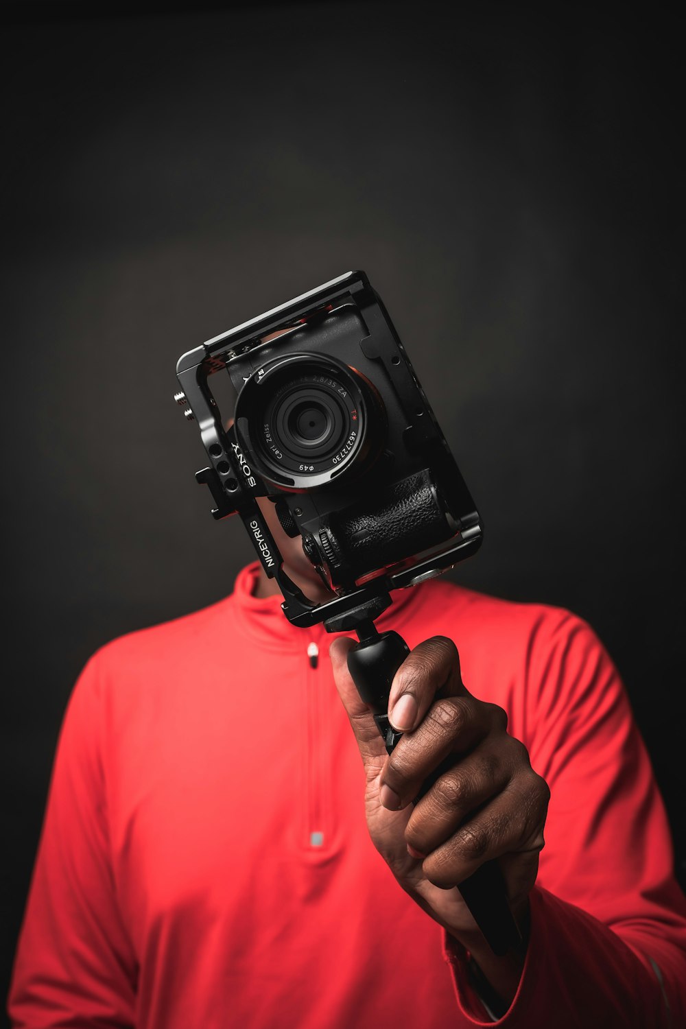 a person holding a camera