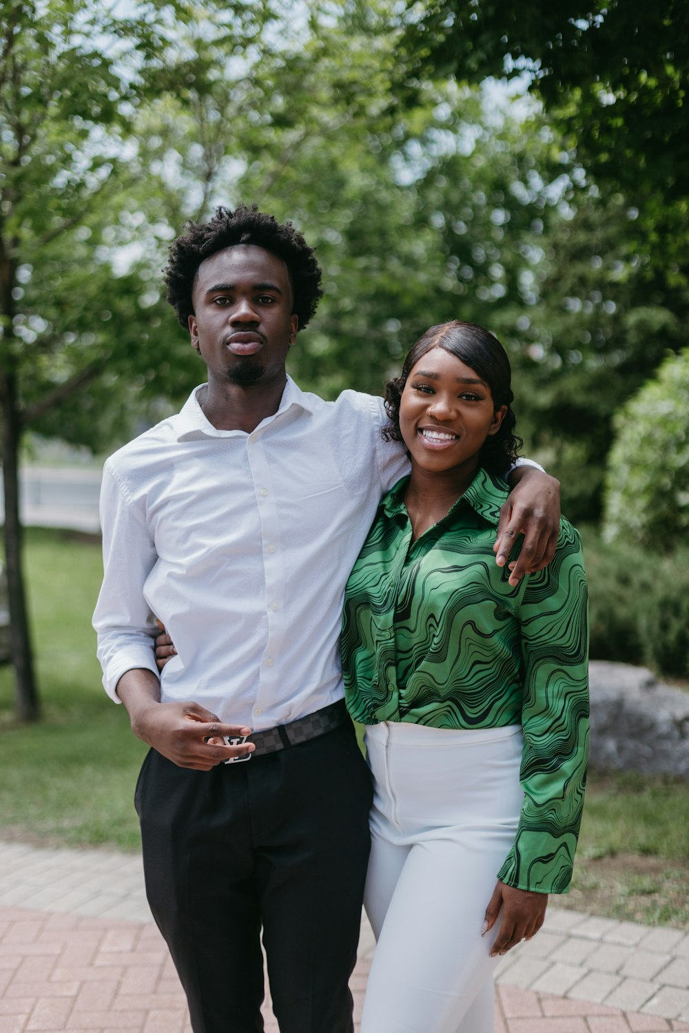 a man and woman posing for a picture