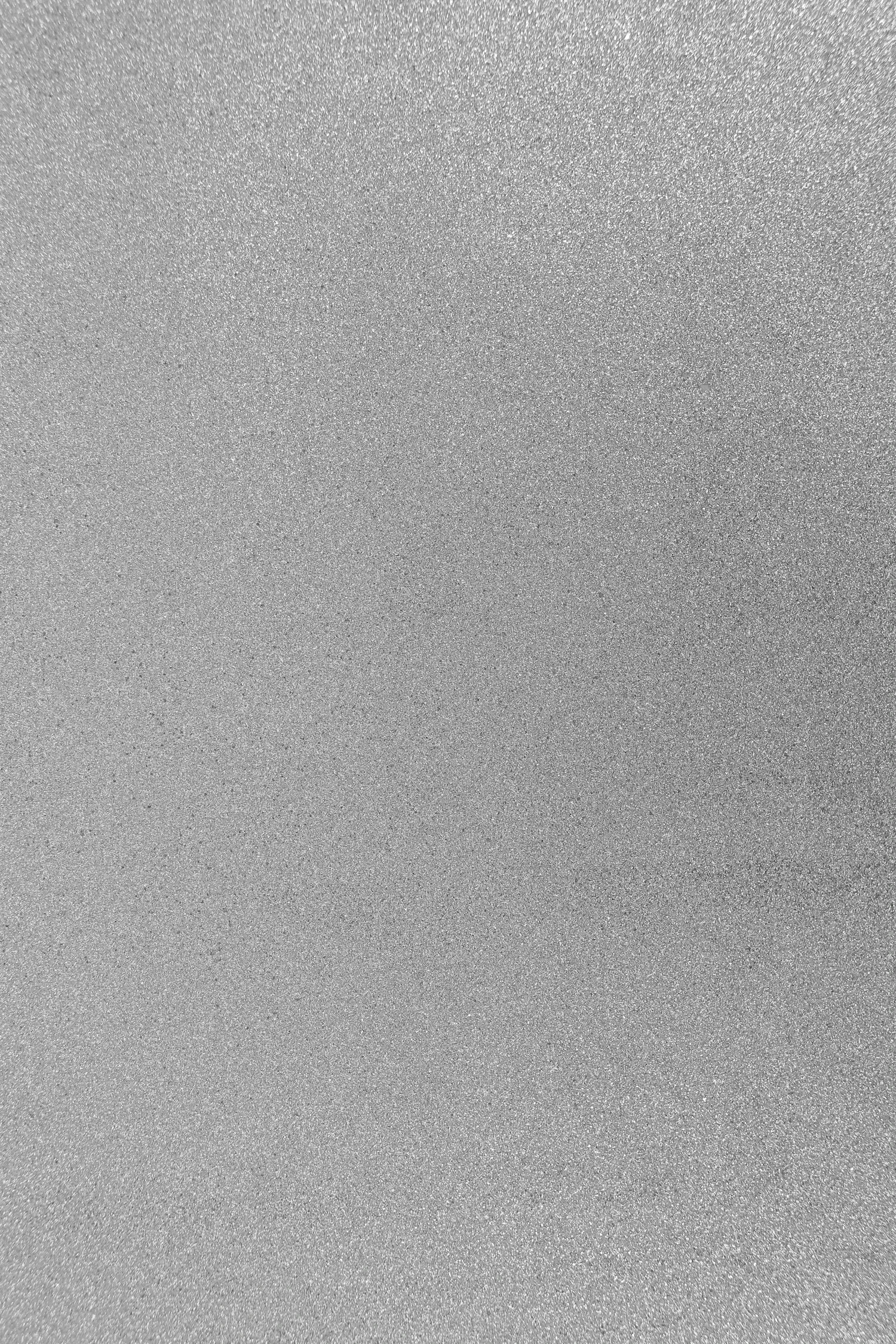 A finely grained metal surface filling the frame