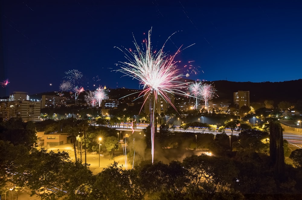 fireworks in the sky over a city