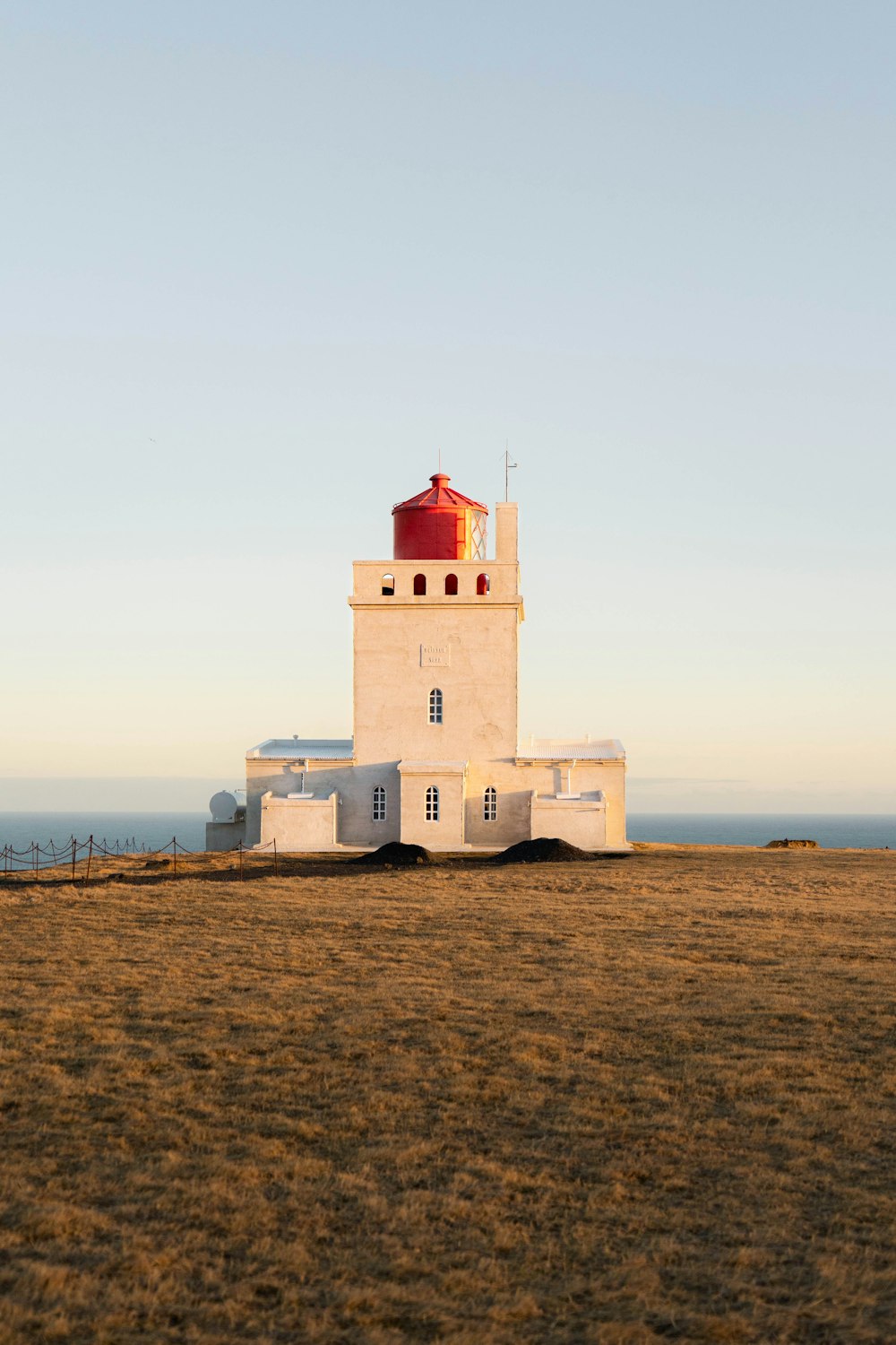 a lighthouse on a beach