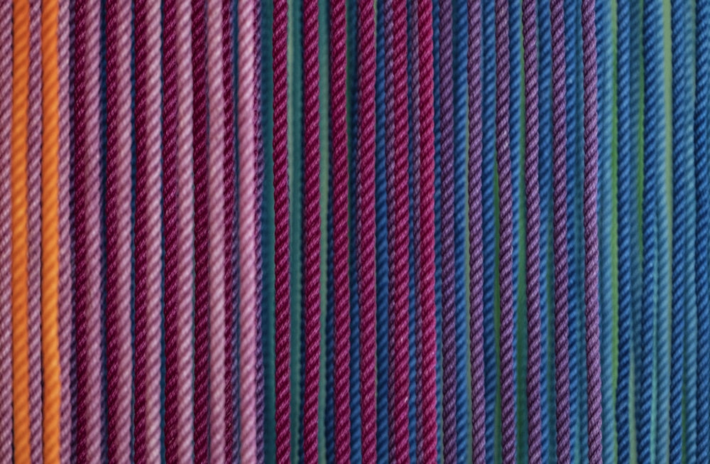 a close up of a red and blue striped wall