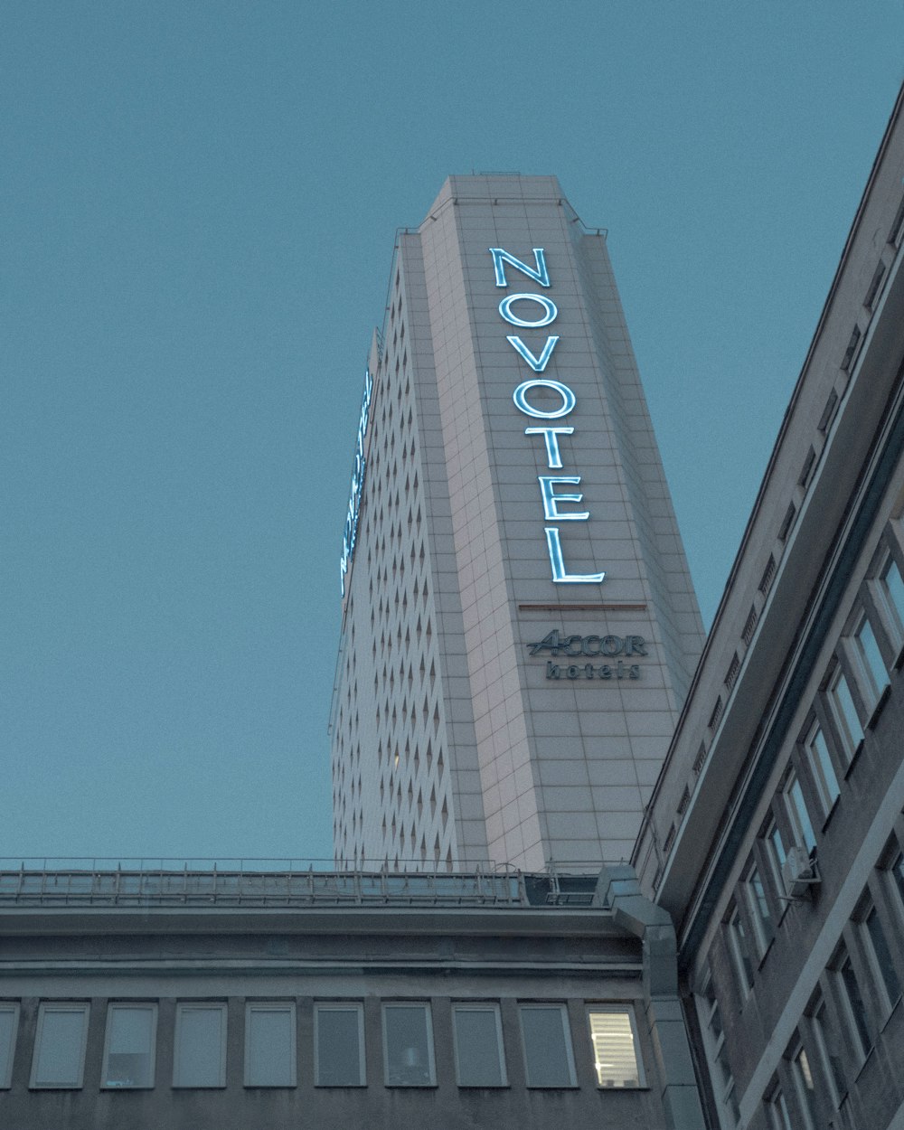 a tall building with a sign on it