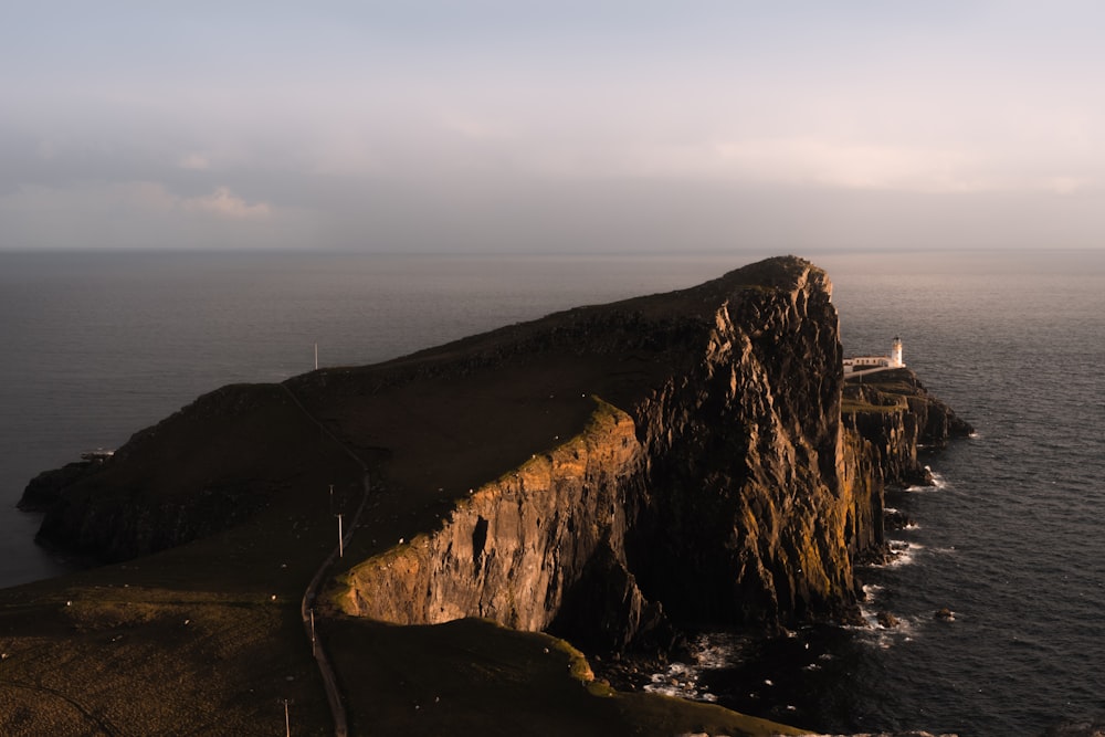 a lighthouse on a cliff