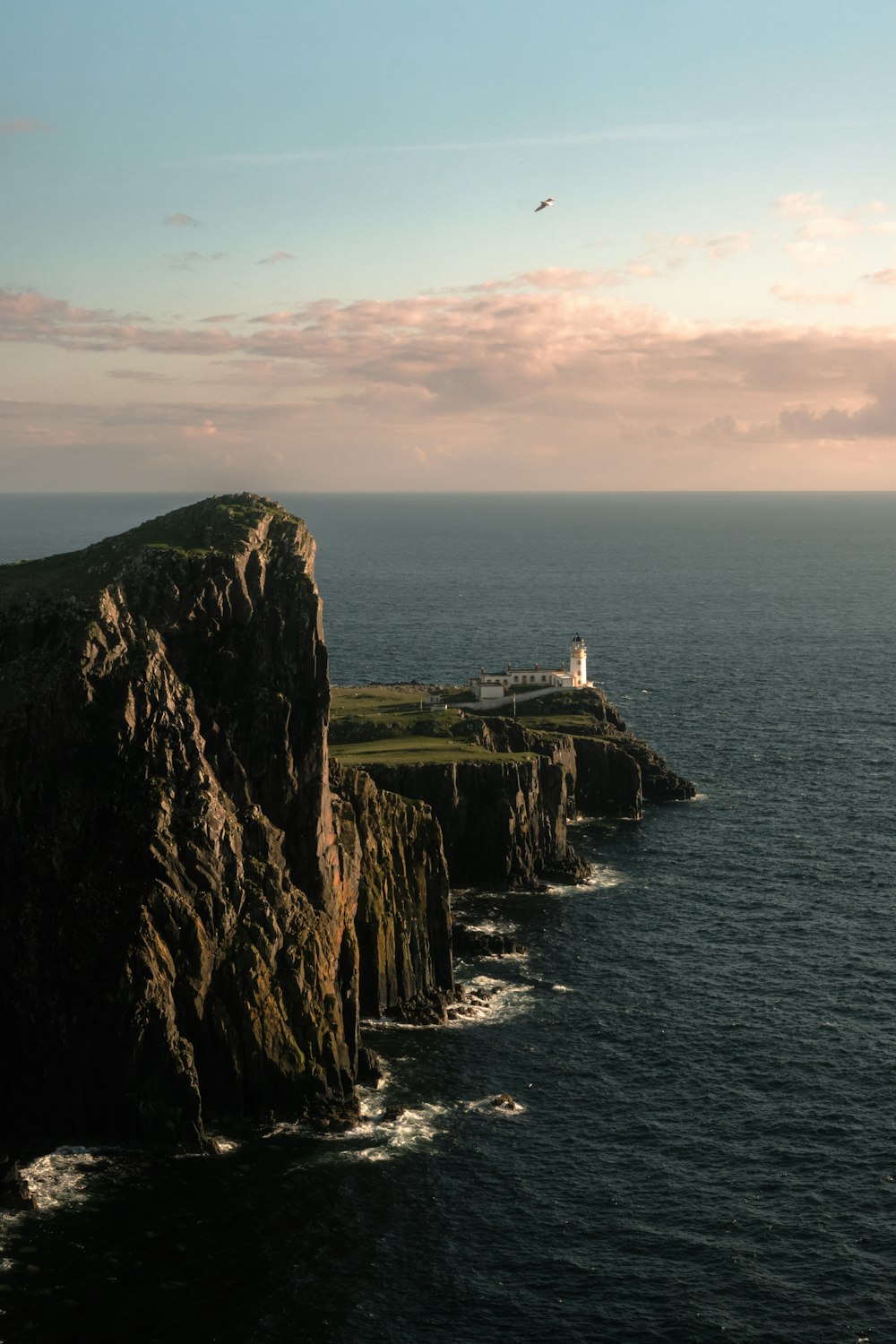 a lighthouse on a cliff
