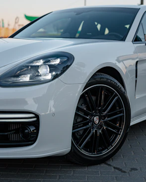 a white car with a black rim